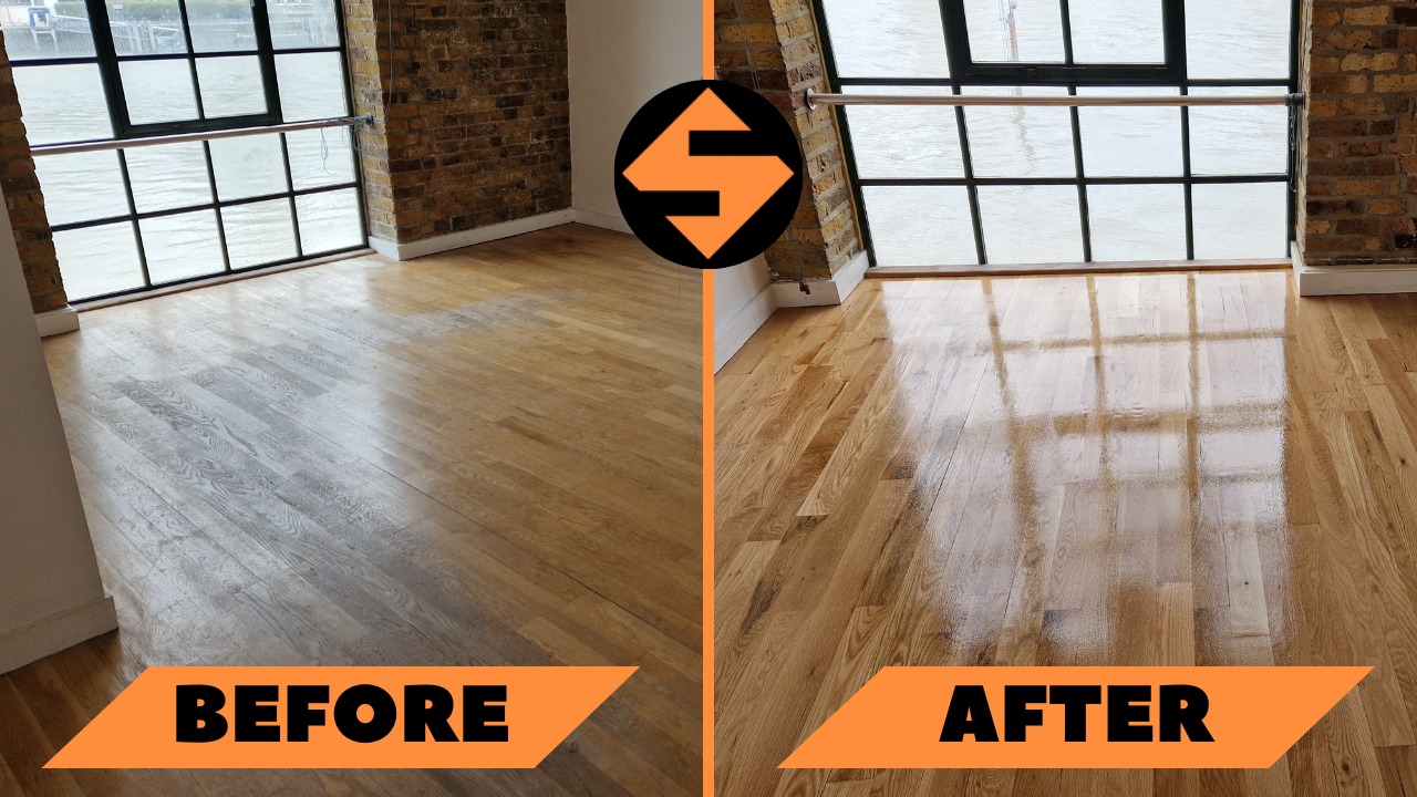 A before-and-after comparison of a wooden floor in a room with large industrial-style windows and exposed brick walls. The left side shows the floor before sanding, appearing dull and worn. The right side showcases the same floor after sanding and refinishing, now smooth, polished, and with a rich, warm wood tone that reflects the light streaming through the windows. The logo of "Sanding Wood Floors" is placed in the center between the images.